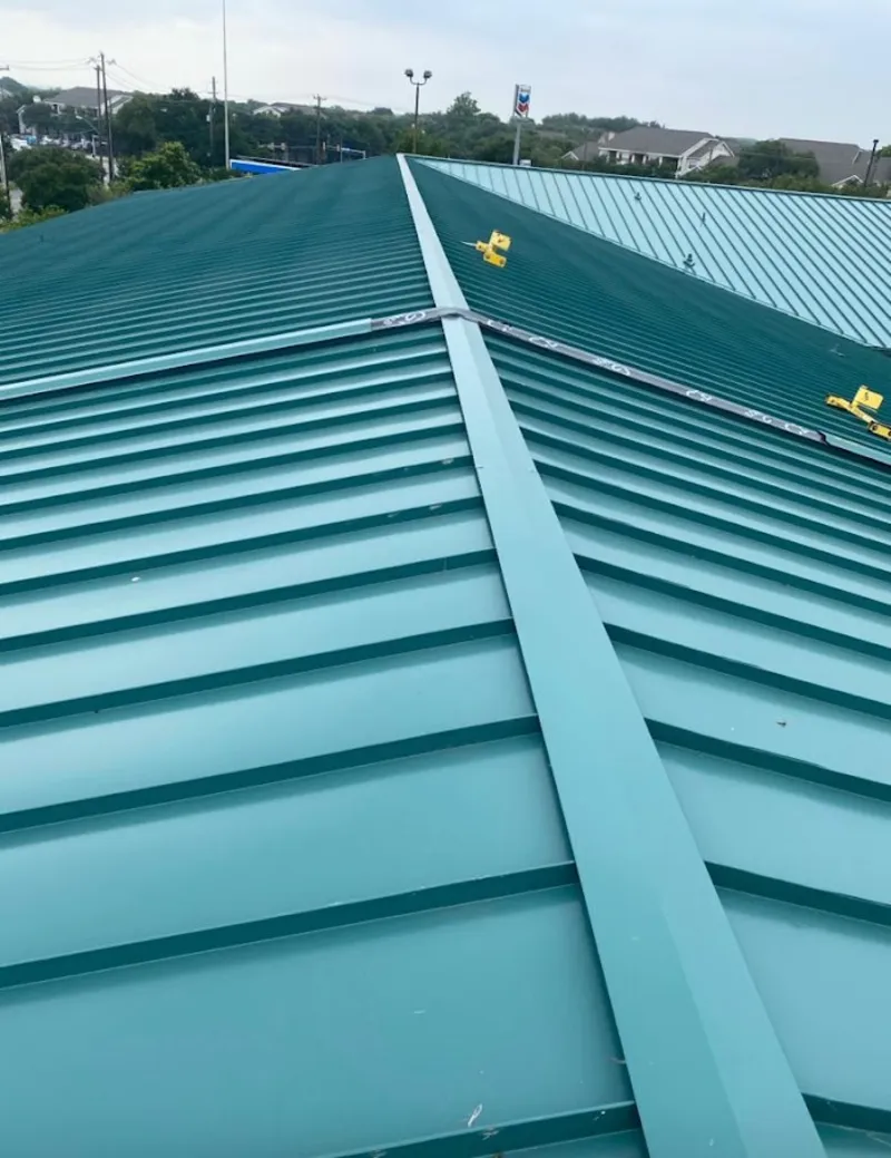 Green commercial metal roof ridge and valley for Metal Roof Repair in Lima